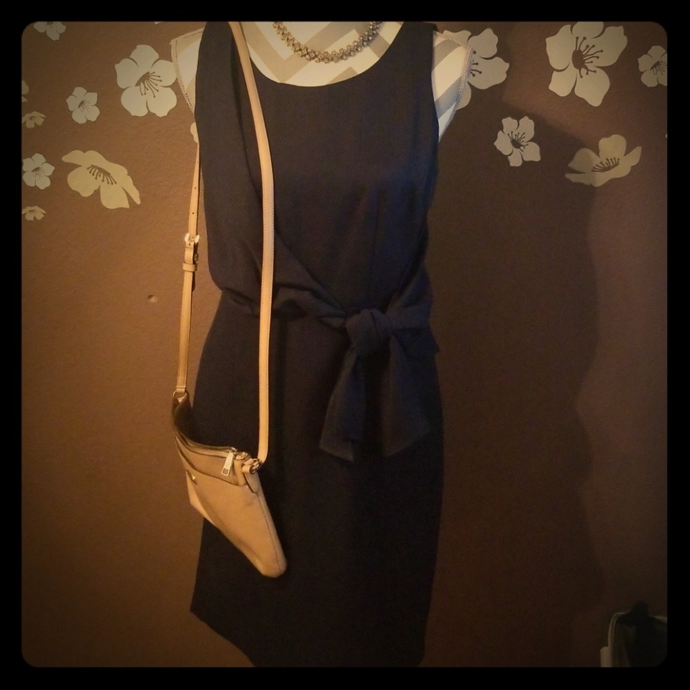 Adorable blue dress with bow detail